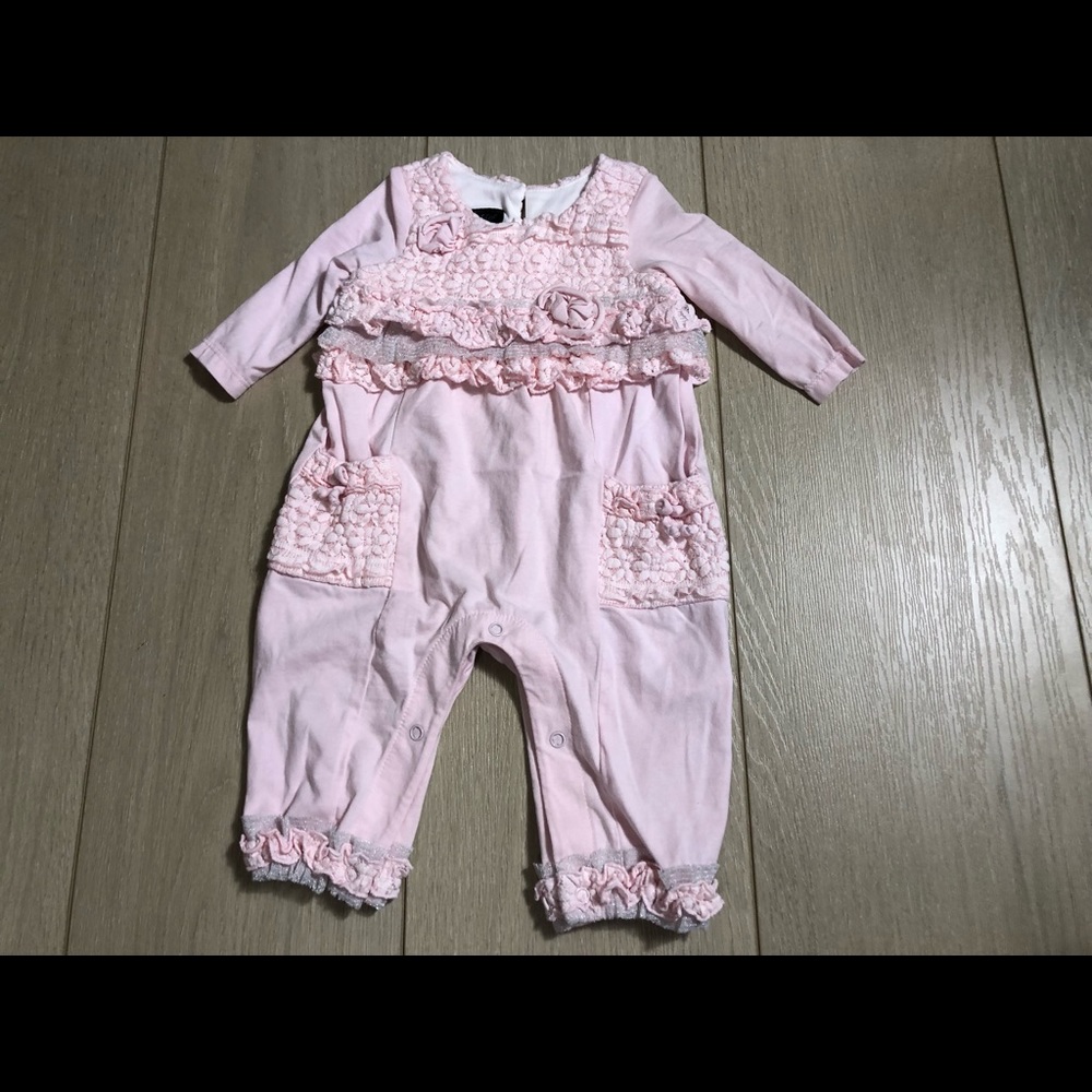 Light pink baby body suit by isobella and Chloe